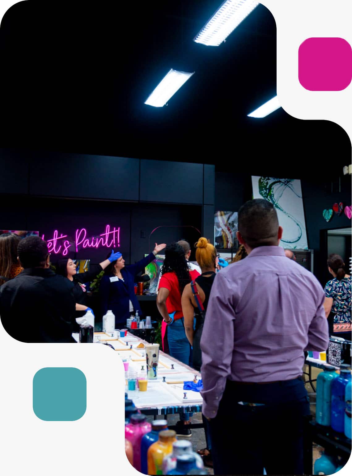 A team gathered at ATL Fluid Art for a corporate team building event
